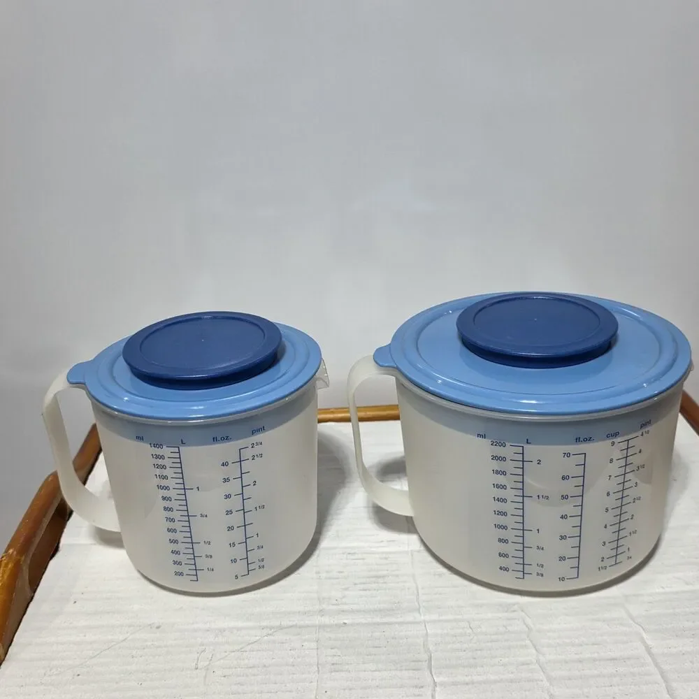 2) Mix & Store Measuring Containers. Handles and Blue lids 1) 1400ML & 1) 2200ML